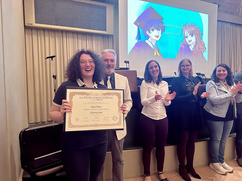 Studentessa con diploma alla cerimonia di diploma 2026 Studentessa con diploma alla cerimonia di diploma 2026