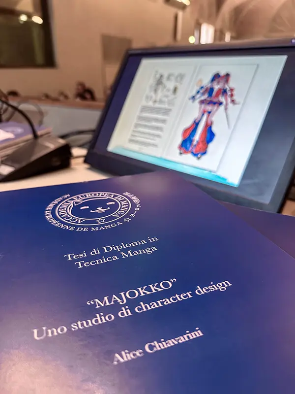 Tesi e monitor con proiezione delle slides per la sessione di diploma 2026 Tesi e monitor con proiezione delle slides per la sessione di diploma 2026